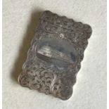 A rare silver card case decorated with flowers and