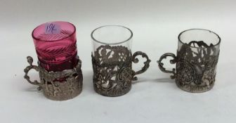 A group of three silver and glass mounted spirit t