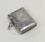 An Edwardian engraved silver vesta case with hinge