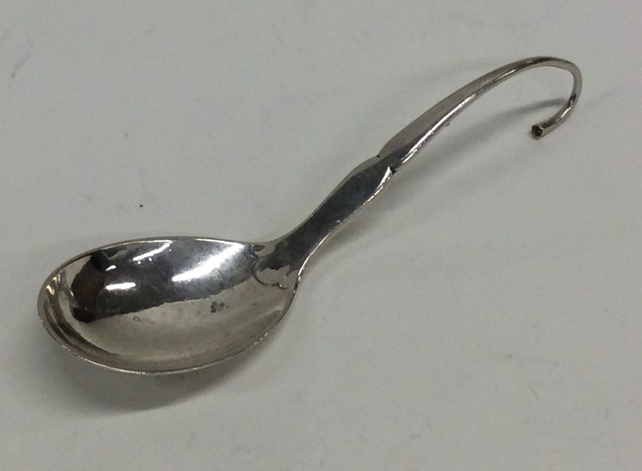 GEORG JENSEN: A stylish silver caddy spoon of typi