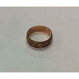 A 9 carat heart shaped keeper ring. Approx. 3 gram