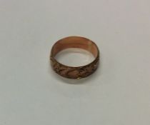 A 9 carat heart shaped keeper ring. Approx. 3 gram