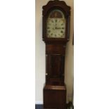 A mahogany grandfather clock with painted dial and