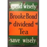 A rectangular cast iron and enamel 'Brooke Bond' t
