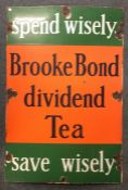 A rectangular cast iron and enamel 'Brooke Bond' t