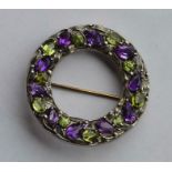 SUFFRAGETTE: A stylish circular silver brooch attr