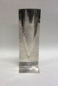 A stylish silver vase of modernistic design with s