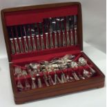 A large silver plated bead edge cutlery service. E