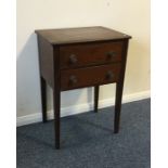 A narrow two drawer side table on tapering support
