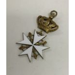 An unusual silver gilt and enamel Maltese cross wi