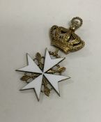 An unusual silver gilt and enamel Maltese cross wi