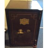 An old metal safe. Est. £40 - £60.