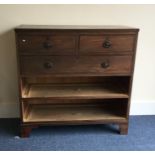 A Georgian mahogany chest of five drawers on brack