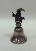 A heavy Continental silver table bell mounted with