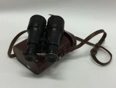 A good pair of cased binoculars. By Carpenter of L