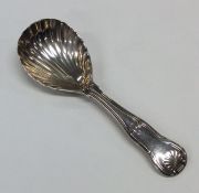 A Queens' pattern silver caddy spoon with fluted b