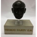 A large bust depicting Thomas Hardy mounted upon s