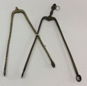 Two pairs of 18th Century brass ember tongs. Est.