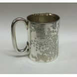 An attractively engraved silver christening cup wi