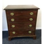A Georgian mahogany chest of four drawers with bra