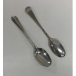 A pair of George I rat tail silver spoons. London.