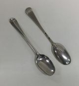 A pair of George I rat tail silver spoons. London.