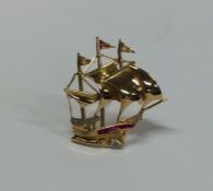 A ruby and diamond brooch in the form of a galleon