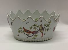 An attractive jardiniere with shaped edge d