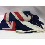 An old Union flag together with two others. Est. £