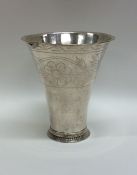 A Swedish tapering silver cup decorated with flowe