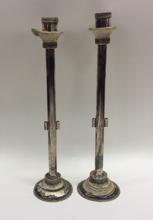 A pair of unusual Continental silver and hard ston