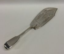 A Georgian silver fiddle pattern fish slice. Londo