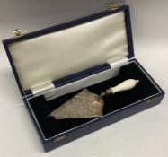 A cased silver presentation trowel engraved with f