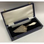 A cased silver presentation trowel engraved with f