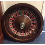 A large mahogany and slate bagatelle game. Est. £5