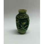 A small tapering Chinese ivory scent bottle. Est.