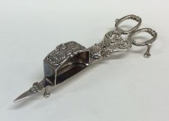 A pair of good Georgian candle snuffers decorated