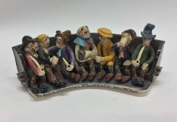 A Will Young pottery group depicting the character