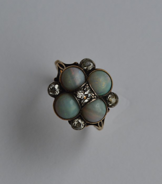 An attractive opal and diamond large cluster ring