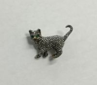 A good gold brooch in the form of a cat in standin