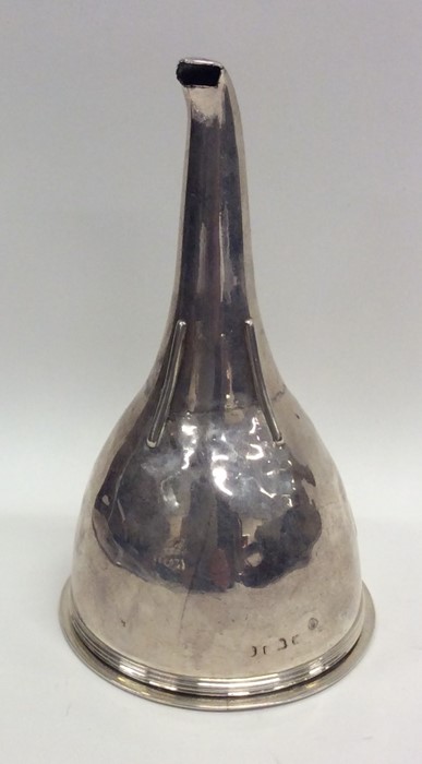 A Georgian silver wine funnel with tapering sides