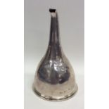 A Georgian silver wine funnel with tapering sides