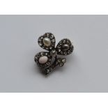 An attractive Victorian clover leaf brooch inset w