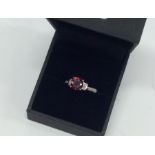 A diamond mounted ring in white gold claw mount. A