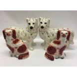 Two pairs of Staffordshire dogs. Est. £20 - £30.