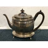 A good Georgian silver bright cut teapot on stand