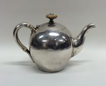 A rare Russian bullet shaped silver teapot with fl