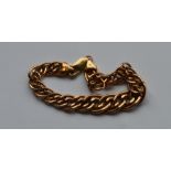 A 9 carat tapering curb link bracelet with conceal