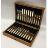 A cased set of twelve (plus twelve) silver plated