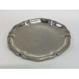 A heavy Continental circular silver waiter with re